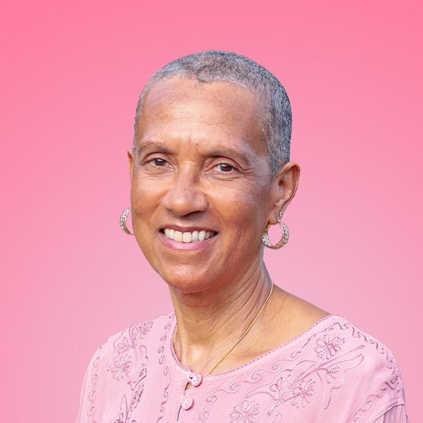 Eutaptics Faster EFT practitioner, Vivien Mehler, smiling on pink background